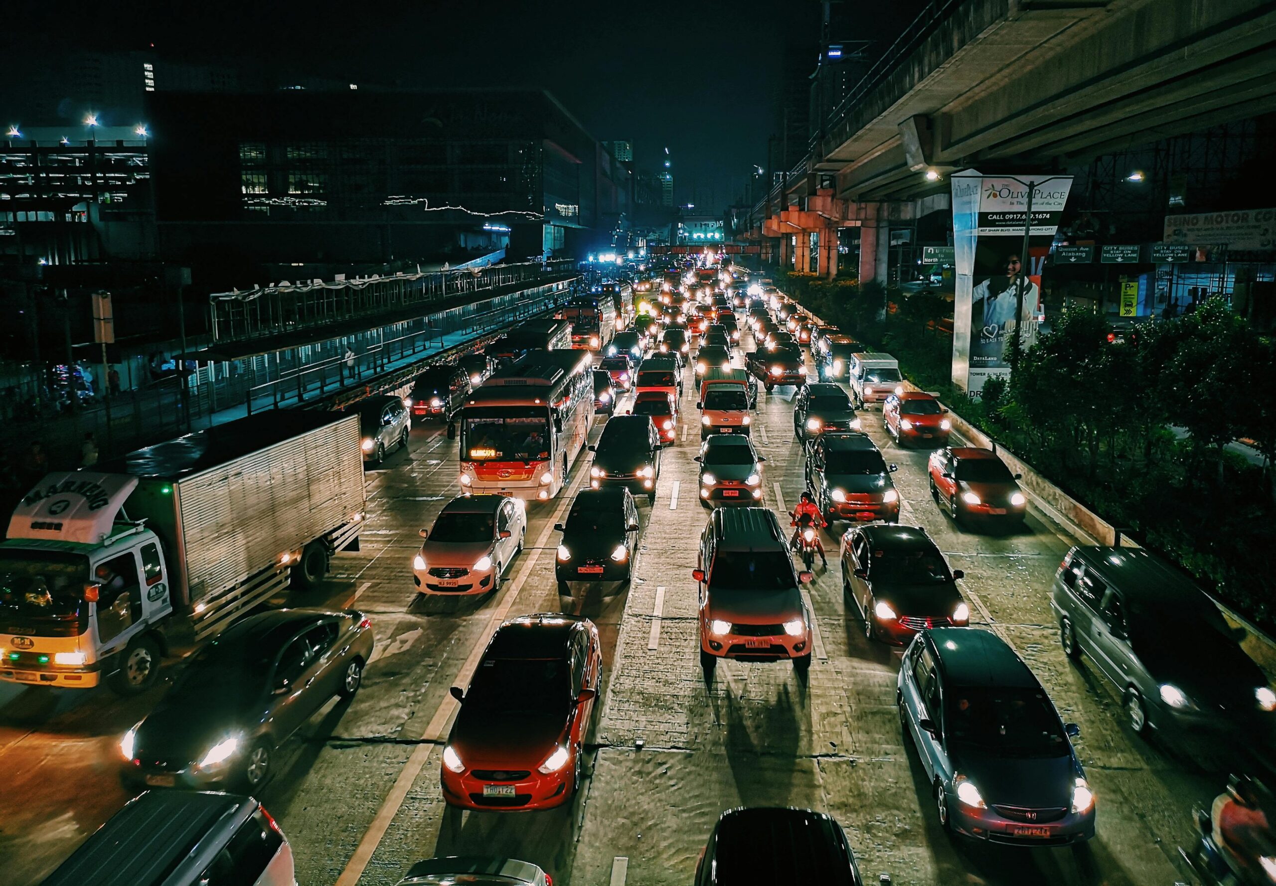 Photo of Vehicles On Road During Evening