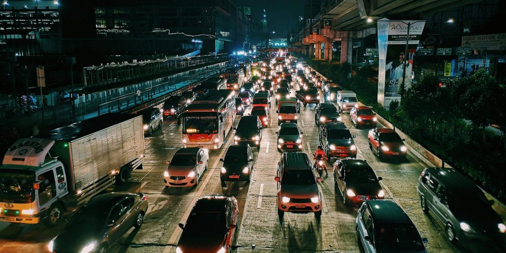 Photo of Vehicles On Road During Evening